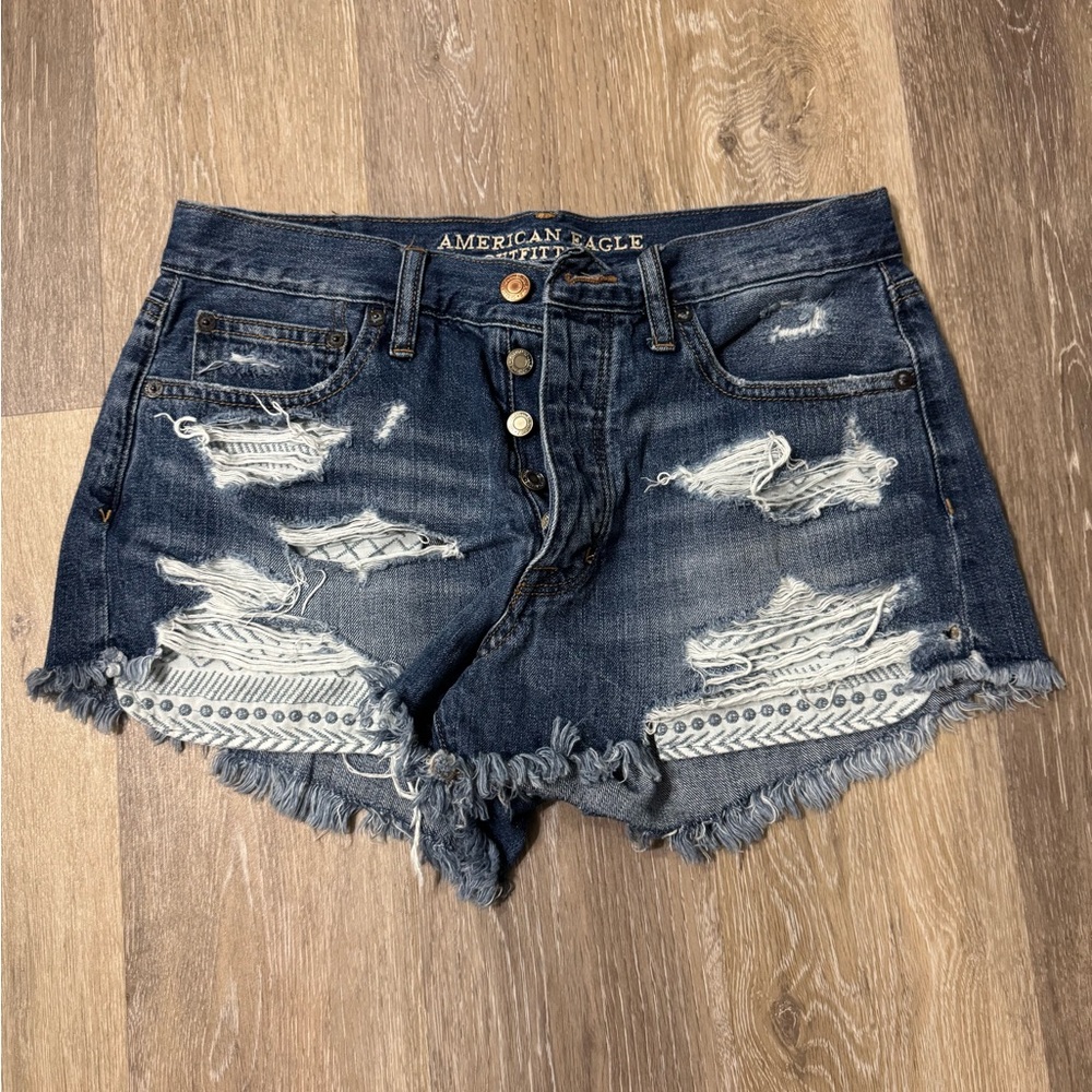 Distressed shorts with pocket detail